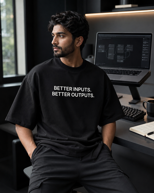 BETTER INPUTS. BETTER OUTPUTS. black oversized terry t-shirt by BYTWEAR - worn by model
