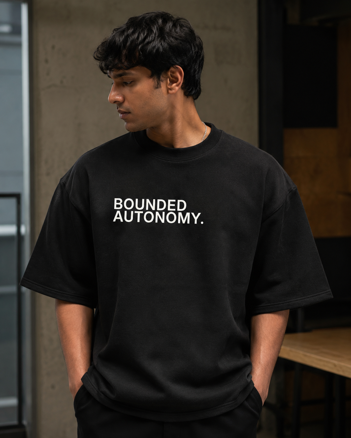 BOUNDED AUTONOMY. black oversized terry t-shirt by BYTWEAR - fabric and print detail
