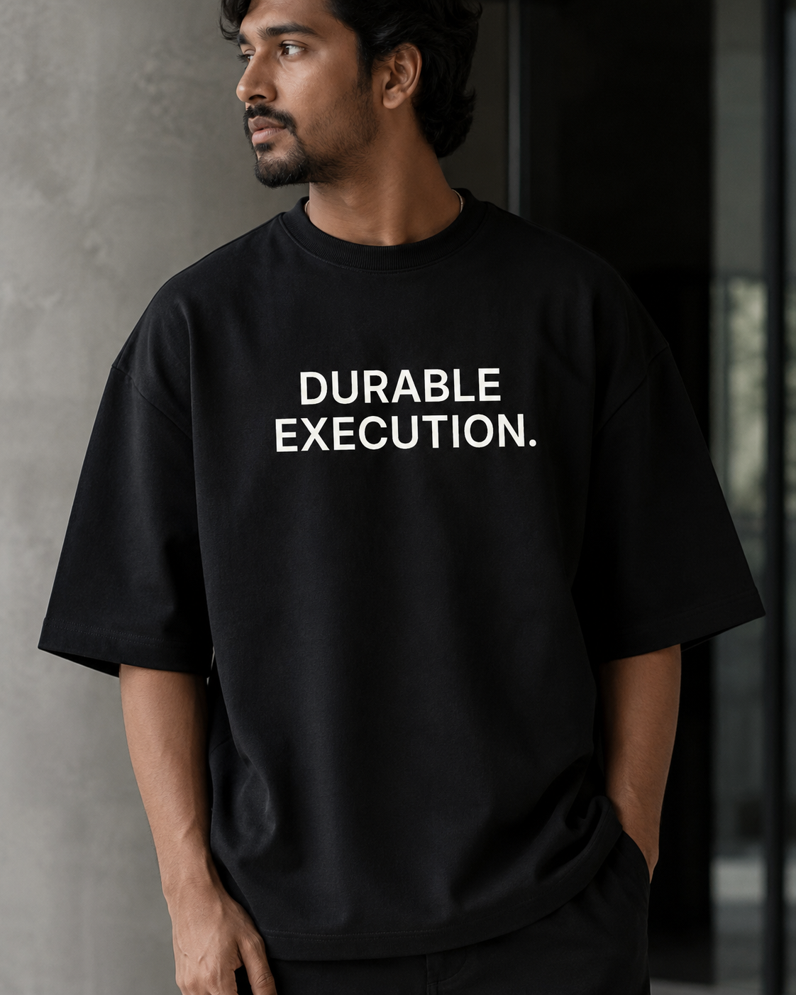 DURABLE EXECUTION. black oversized terry t-shirt by BYTWEAR - oversized fit detail