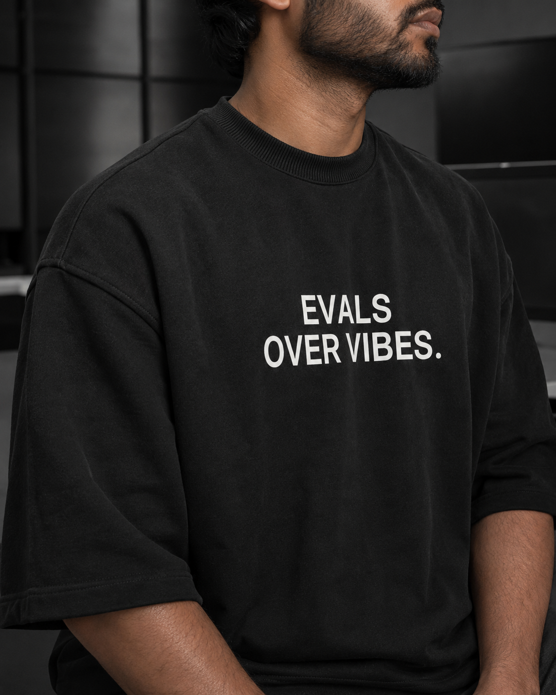 EVALS OVER VIBES. black oversized terry t-shirt by BYTWEAR - fabric and print detail