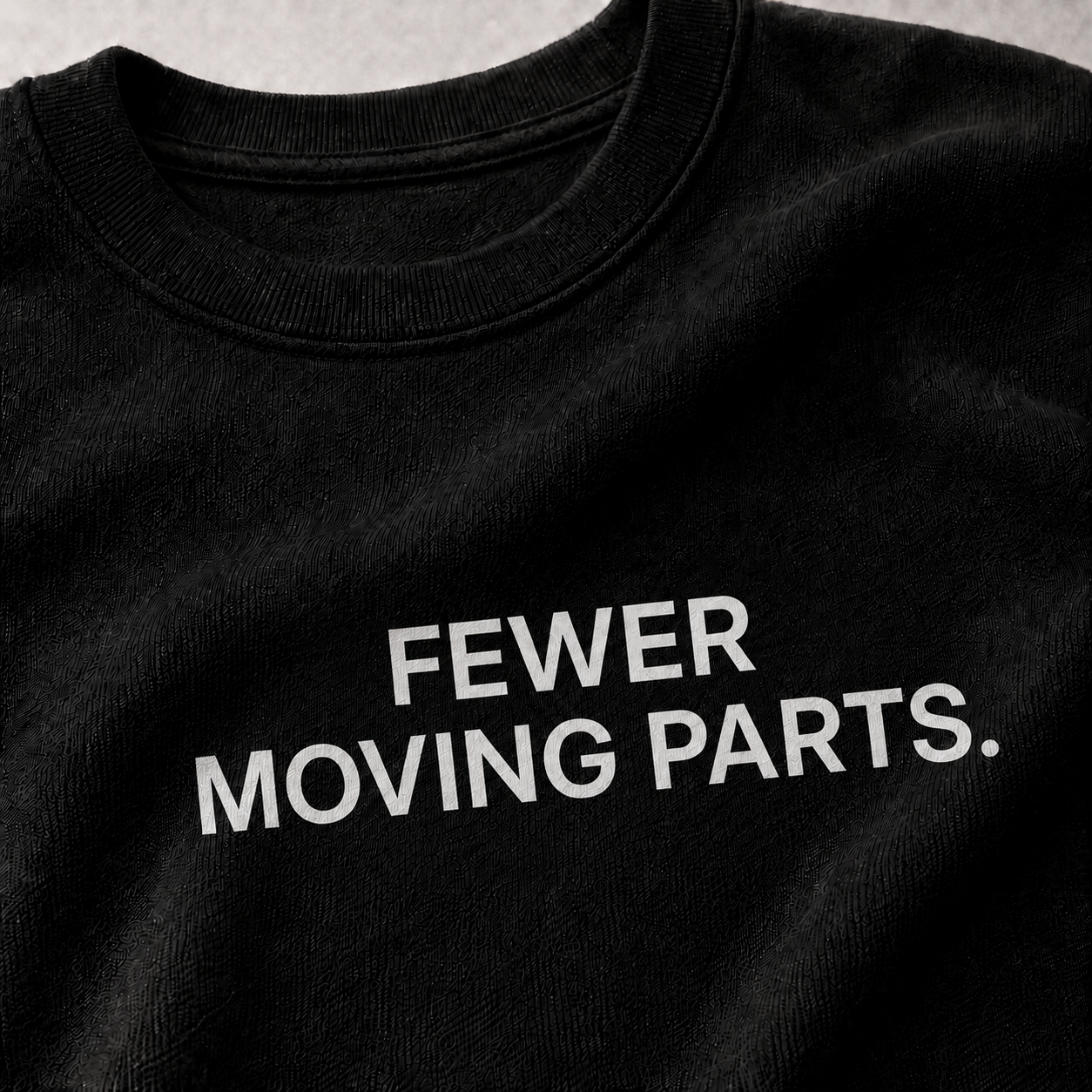 FEWER MOVING PARTS. black oversized terry t-shirt by BYTWEAR - fabric and print detail
