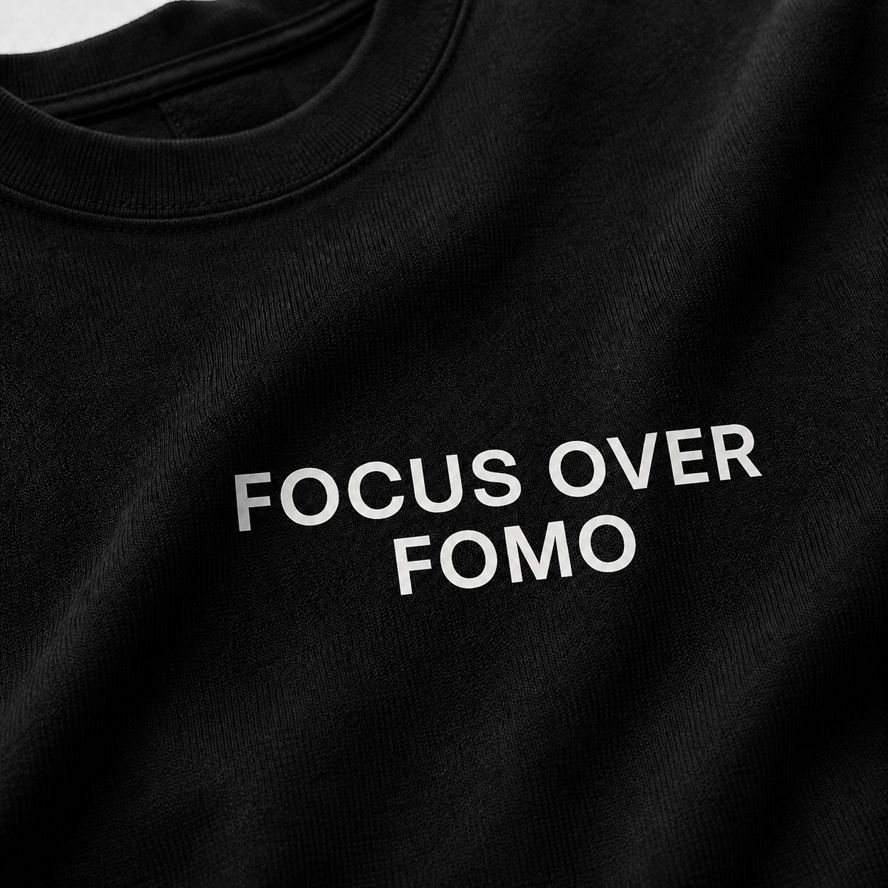 FOCUS OVER FOMO black oversized terry t-shirt by BYTWEAR - fabric and print detail
