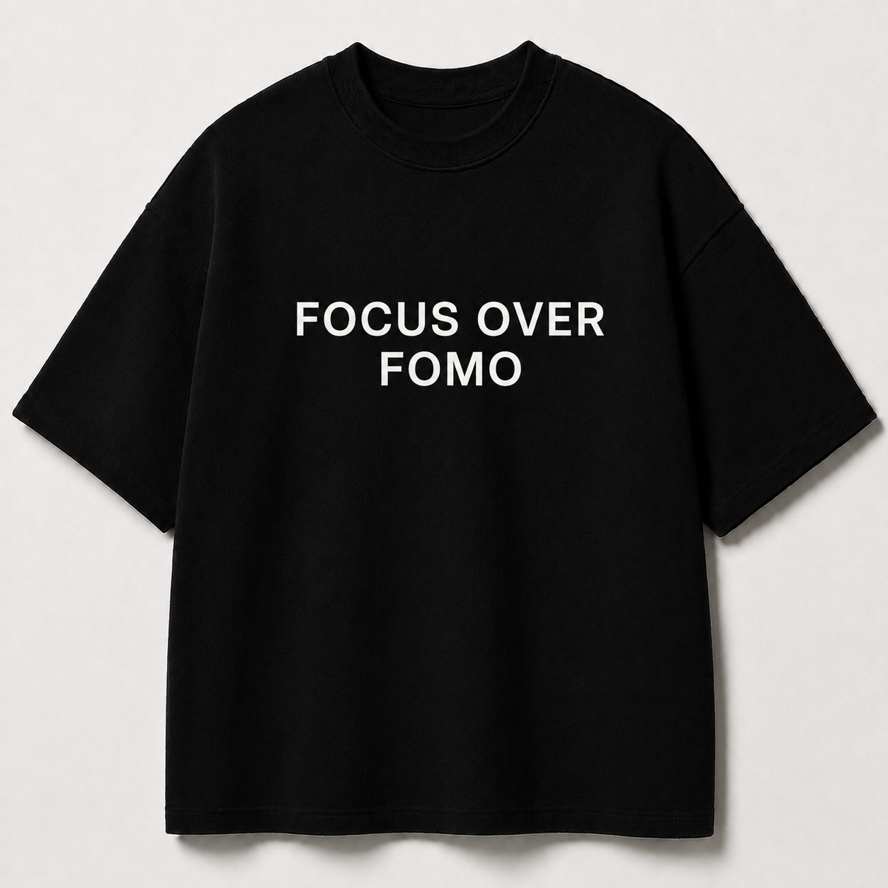 FOCUS OVER FOMO black oversized terry t-shirt by BYTWEAR - front view