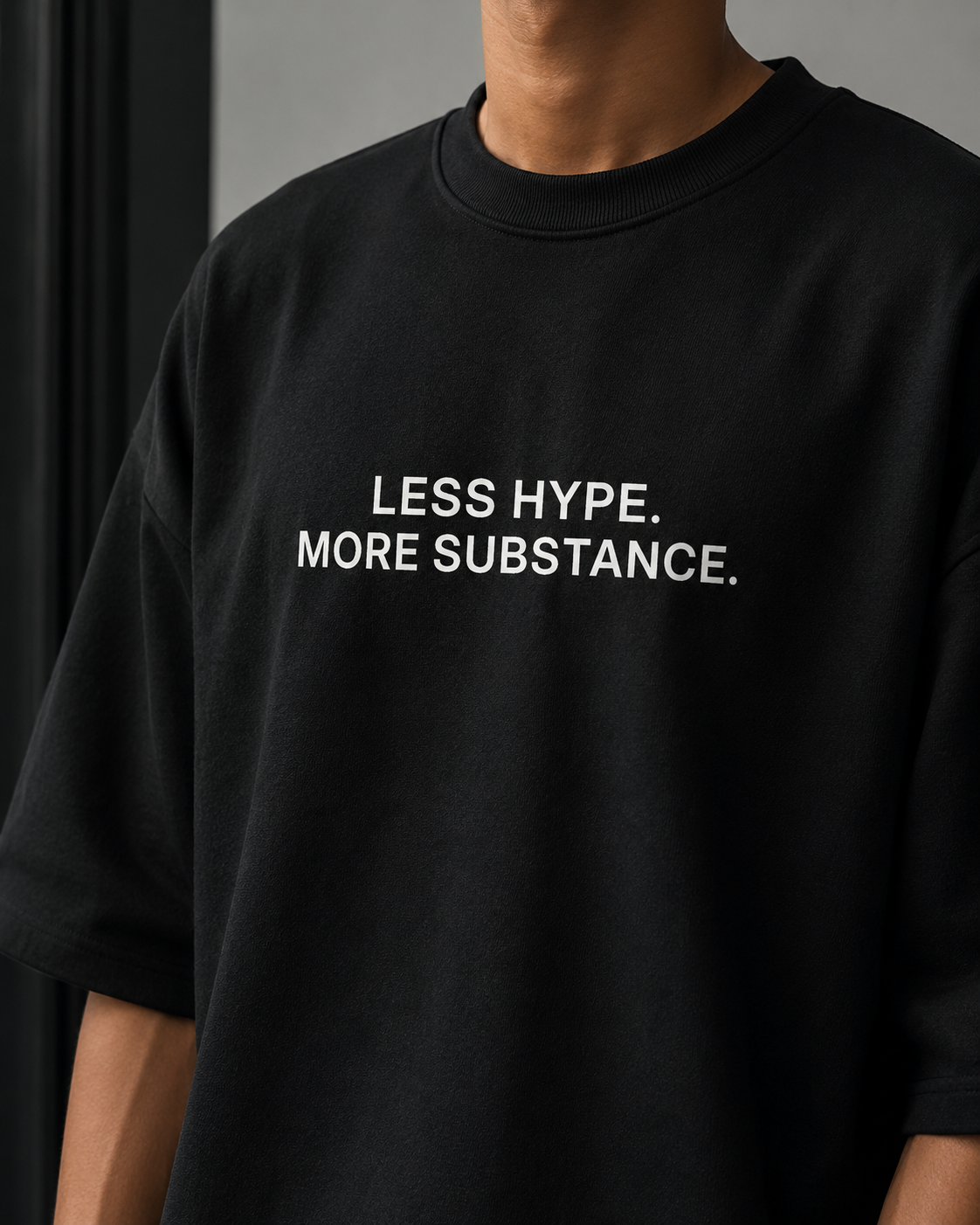 LESS HYPE. MORE SUBSTANCE. black oversized terry t-shirt by BYTWEAR - fabric and print detail
