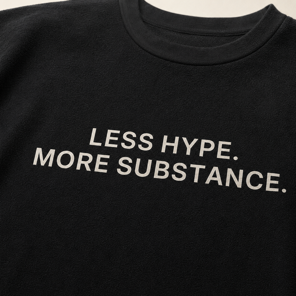 LESS HYPE. MORE SUBSTANCE. black oversized terry t-shirt by BYTWEAR - fabric and print detail