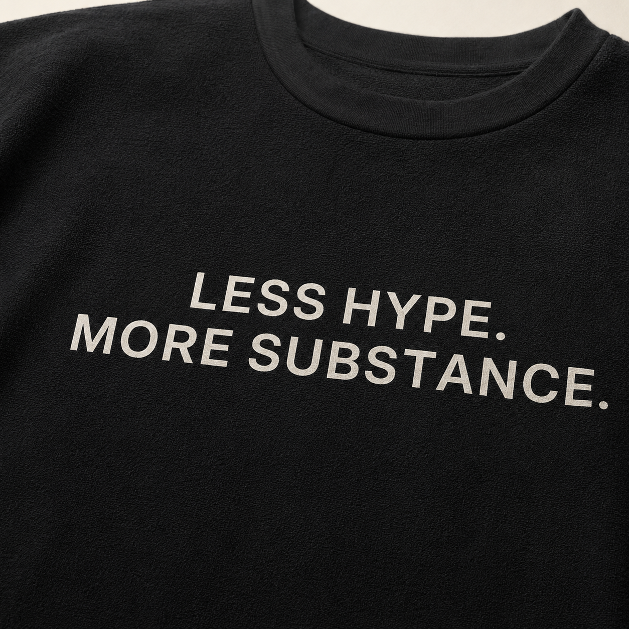 LESS HYPE. MORE SUBSTANCE. black oversized terry t-shirt by BYTWEAR - fabric and print detail