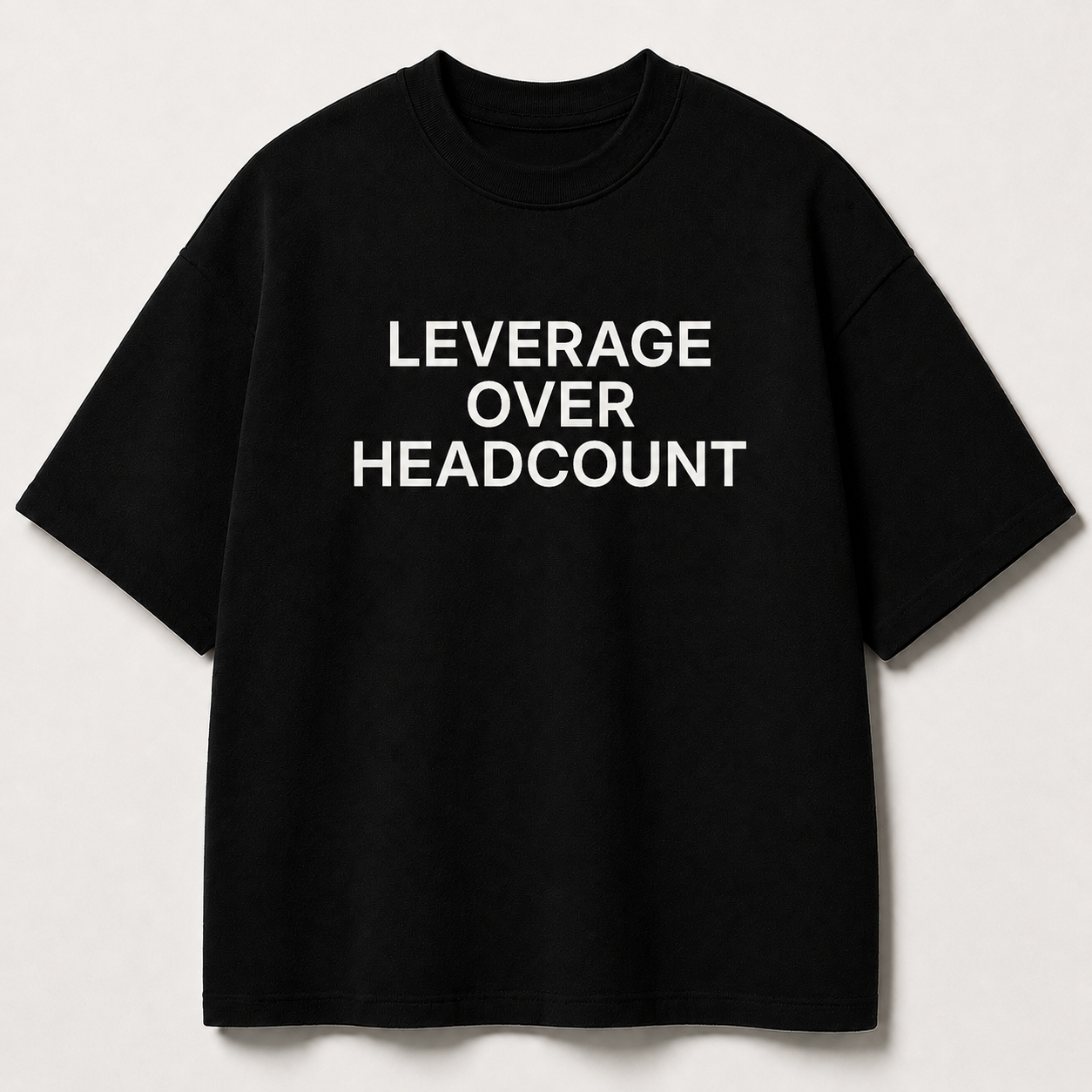 LEVERAGE OVER HEADCOUNT black oversized terry t-shirt by BYTWEAR - front view