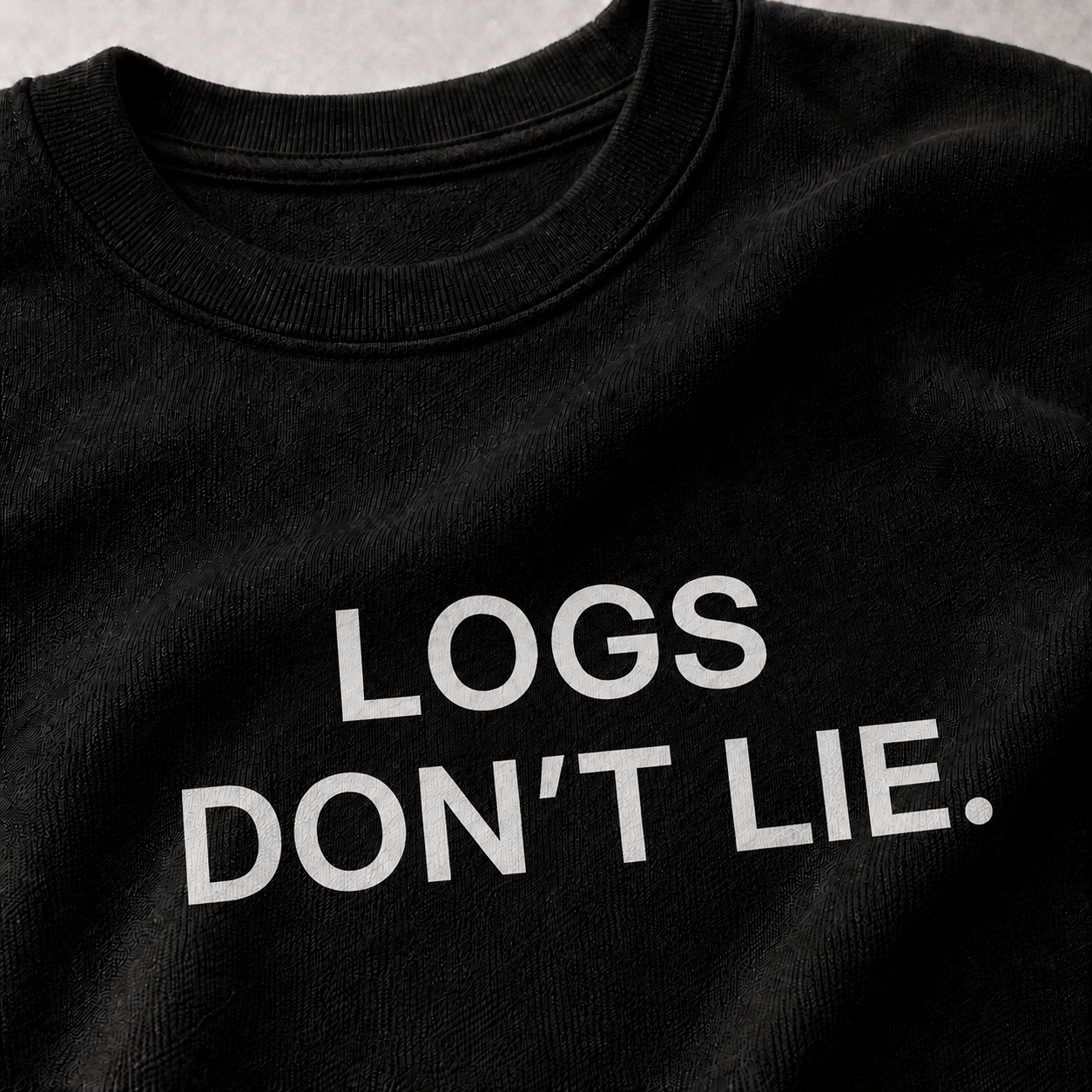 LOGS DON’T LIE. black oversized terry t-shirt by BYTWEAR - fabric and print detail