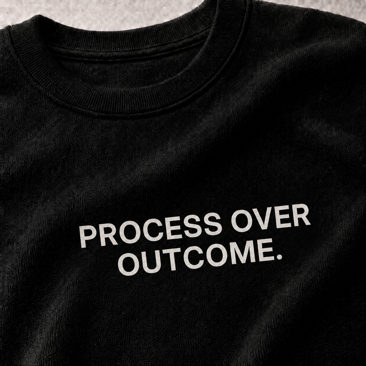 PROCESS OVER OUTCOME. black oversized terry t-shirt by BYTWEAR - fabric and print detail