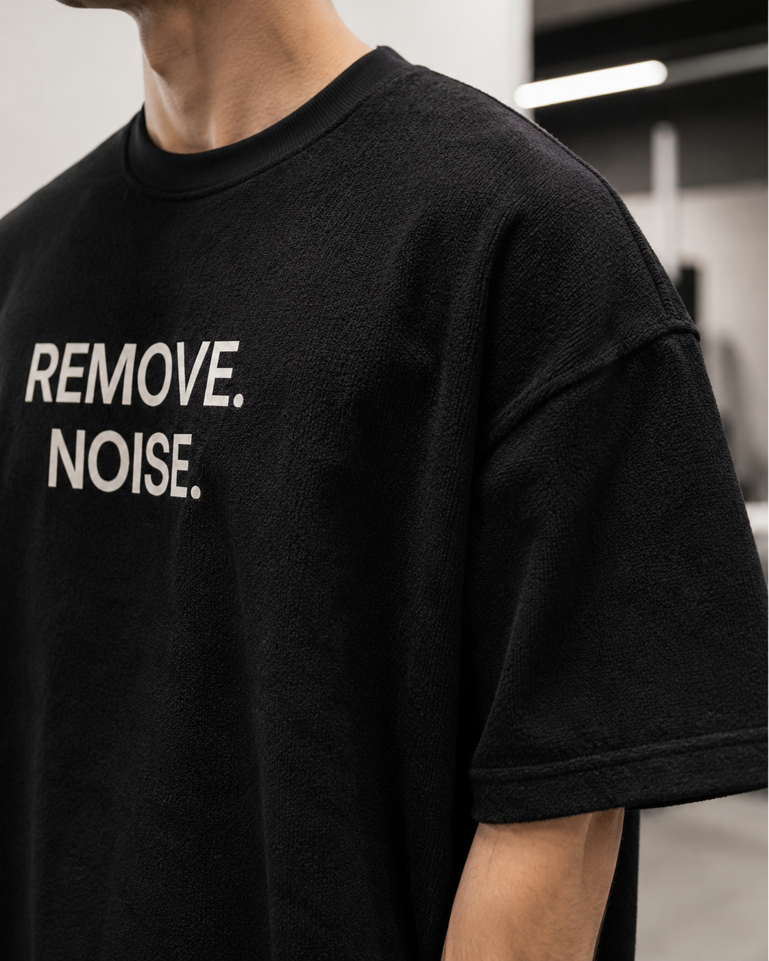REMOVE. NOISE. black oversized terry t-shirt by BYTWEAR - fabric and print detail