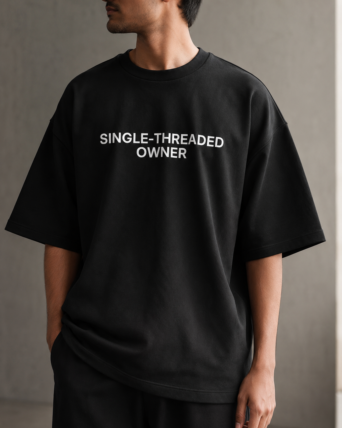SINGLE-THREADED OWNER black oversized terry t-shirt by BYTWEAR - oversized fit detail