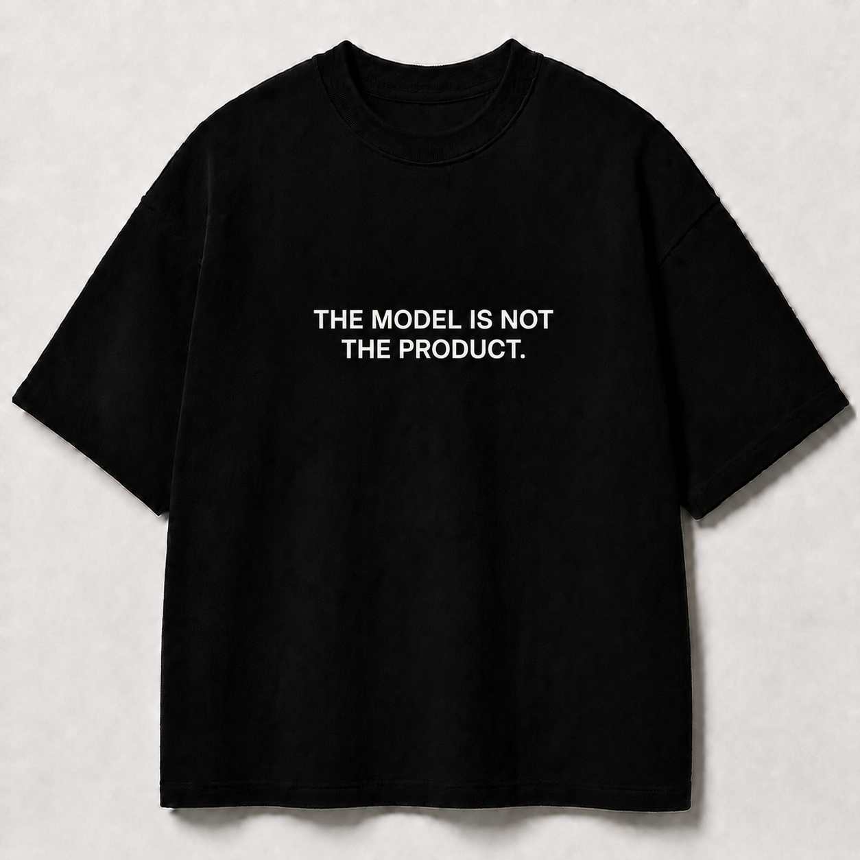 THE MODEL IS NOT THE PRODUCT. black oversized terry t-shirt by BYTWEAR - front view