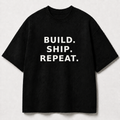 Build. Ship. Repeat. black oversized terry t-shirt by BYTWEAR - front view